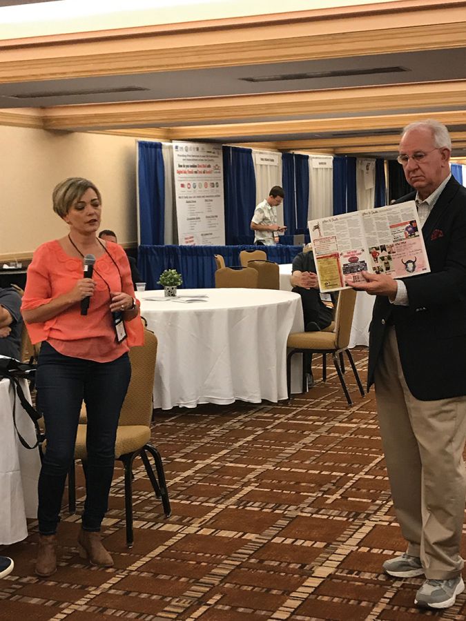 Jessica Prevatt, advertising director, The Baker County Press, Macclenny, Florida, shared details of the Press’ Christmas magazine with a special ‘shop local’ map, while moderator Robert M. Williams Jr. shows a copy. The most popular session at convention, the Great Idea Exchange, was sponsored by Google News Initiative. Jessica Prevatt, advertising director, The Baker County Press, Macclenny, Florida, shared details of the Press’ Christmas magazine with a special ‘shop local’ map, while moderator Robert M. Williams Jr. shows a copy. The most popular session at convention, the Great Idea Exchange, was sponsored by Google News Initiative.