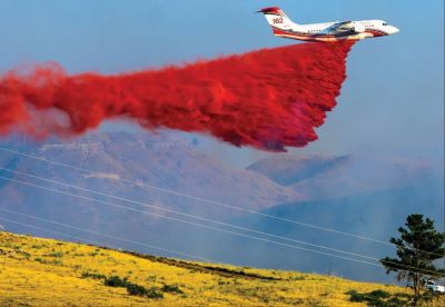 A BAE-146 air tanker, capable of carrying 3,000 gallons of retardant, drops its payload during the Aristocrat Fire south of campus, Friday. (FIRST PLACE, Best Breaking News Photo, Non-daily Division, circ. less than 5,000 | Brandon Davenport, The Eagle, Chadron, Nebraska) A BAE-146 air tanker, capable of carrying 3,000 gallons of retardant, drops its payload during the Aristocrat Fire south of campus, Friday. (FIRST PLACE, Best Breaking News Photo, Non-daily Division, circ. less than 5,000 | Brandon Davenport, The Eagle, Chadron, Nebraska)