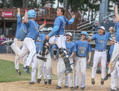 SPORTS — Eau Claire North’s Jonah Hanson (15) and the rest of the Huskies celebrate after Gabe Richardson hit a home run against Eau Claire Memorial on May 5 at Carson Park. (AUGUST 9, 2022) (Branden Nall | Leader-Telegram, Eau Claire, Wisconsin)