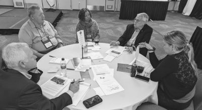 At the NNA Foundation s 137th Annual Convention & Trade Show in San Francisco, Anderson -- second from left -- participates in the flash session, Hosting Community Forums on the Value of Journalism, led by Al Cross, second from right, director emeritus of the University of Kentucky’s Institute for Rural Journalism. At the NNA Foundation s 137th Annual Convention & Trade Show in San Francisco, Anderson -- second from left -- participates in the flash session, Hosting Community Forums on the Value of Journalism, led by Al Cross, second from right, director emeritus of the University of Kentucky’s Institute for Rural Journalism.