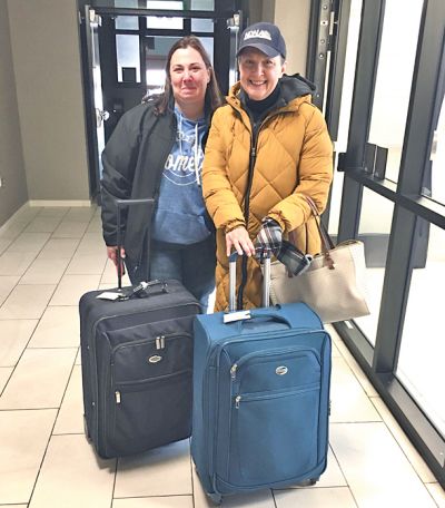 Journal Production Manager Tia LaCombe (left) and Owner/Publisher Cecile Wehrman arrive at their local courthouse with suitcases containing computer equipment to put out the May 4 editions of the Crosby Journal and Tioga Tribune during a five-day power outage, caused by two back-to-back blizzards. The courthouse was the only place they could find with a generator. Wehrman says she s sporting a North Dakota Newspaper Association ball cap because she had not had a chance to shower in three days. “Talk about a bad hair day,” she joked. “But we got our newspapers published.” (provided) Journal Production Manager Tia LaCombe (left) and Owner/Publisher Cecile Wehrman arrive at their local courthouse with suitcases containing computer equipment to put out the May 4 editions of the Crosby Journal and Tioga Tribune during a five-day power outage, caused by two back-to-back blizzards. The courthouse was the only place they could find with a generator. Wehrman says she s sporting a North Dakota Newspaper Association ball cap because she had not had a chance to shower in three days. “Talk about a bad hair day,” she joked. “But we got our newspapers published.” (provided)