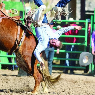 Richard Johnson  | Wickenburg (Arizona) Sun
(Right) Chance West has some tough luck during the saddle bronc riding at the Gold Rush Days Rodeo.