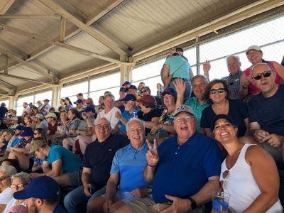 In July 2019, NNA Directors enjoy a game following meetings in Chicago. Front row: Brett Wesner, Chip Hutcheson, John Galer, and a fellow baseball fan. Middle row: Randy Keck, Matt Paxton, Lynne Paxton, Lisa Richardson, Dennis Richardson, Susan Rowell and Wendell Rowell. Back row: Bo Bolton and Laura Johnson.