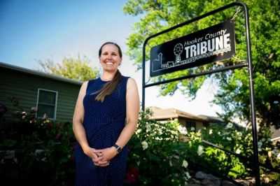 Gerri Peterson, owner and editor of the Hooker County Tribune, runs her newspaper out of an office which is attached to her home, in Mullen, Nebraska. (Photo by Isaac Hale, Deseret News)