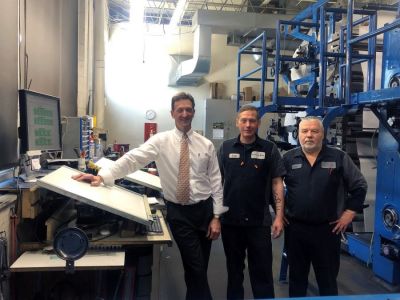 Argus-Press Publisher Tom Campbell, left, along with press operators Scott Carroll and Bill McMann use NewsWayX to monitor page and plate production from the pressroom in Owosso, Michigan. With the cloud based system, the three can keep an eye on the workflow on their phones when they’re between shifts on the weekends. No more coming into work too early for the Friday and Saturday night press runs when late sports coverage pushes back the deadline. Argus-Press Publisher Tom Campbell, left, along with press operators Scott Carroll and Bill McMann use NewsWayX to monitor page and plate production from the pressroom in Owosso, Michigan. With the cloud based system, the three can keep an eye on the workflow on their phones when they’re between shifts on the weekends. No more coming into work too early for the Friday and Saturday night press runs when late sports coverage pushes back the deadline.