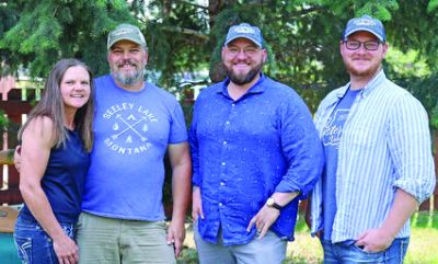 Andi and Nathan Bourne (left) with the new owners of the Seeley Swan Pathfinder, owners of Ponderosa Publications brothers Jesse Mullen (middle right) and Lloyd Mullen (right). Andi and Nathan Bourne (left) with the new owners of the Seeley Swan Pathfinder, owners of Ponderosa Publications brothers Jesse Mullen (middle right) and Lloyd Mullen (right).